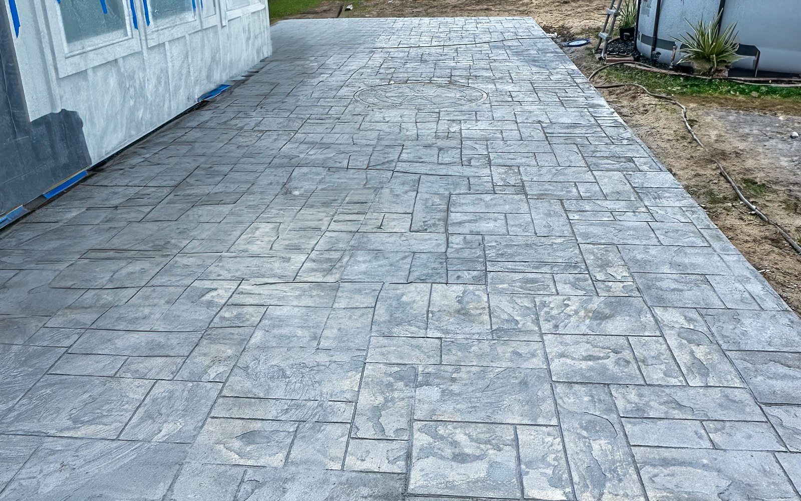 Stamped concrete walkway and patio surface