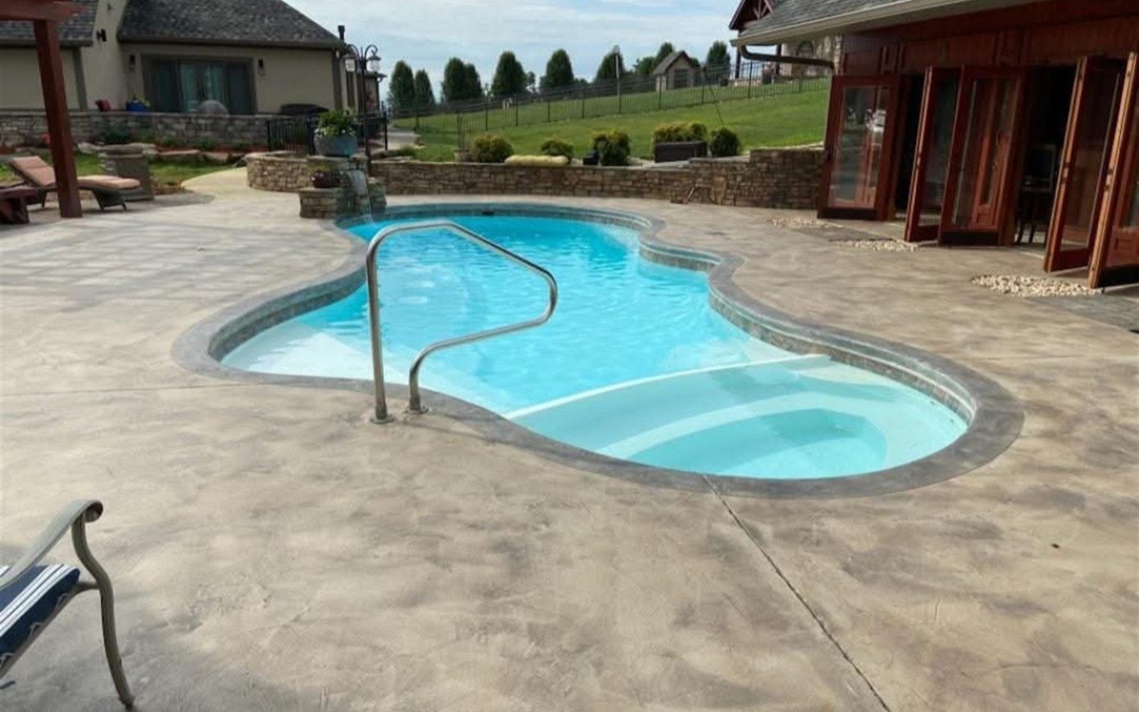 Finished poolside concrete deck