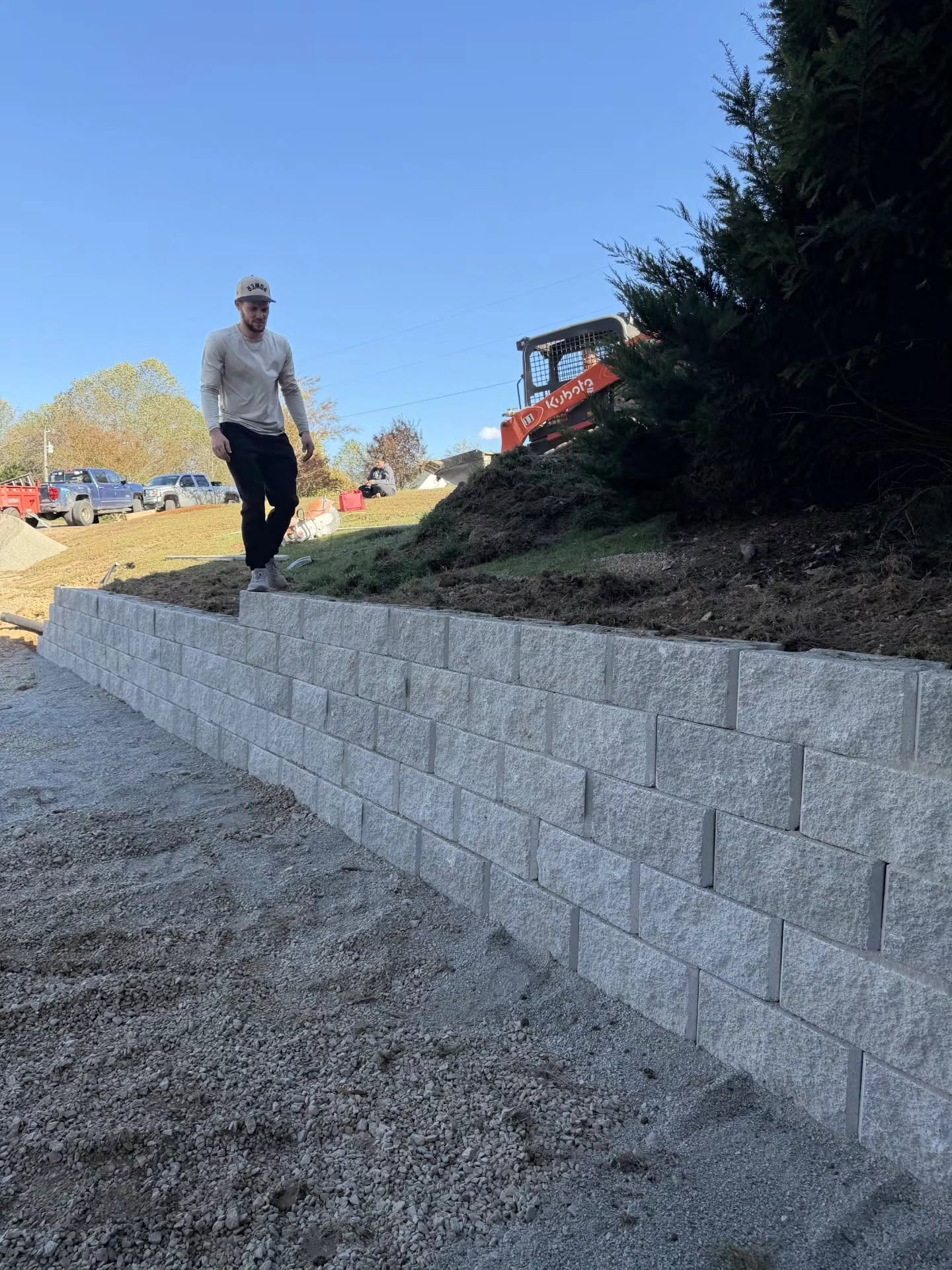 Finished retaining wall with graded site work