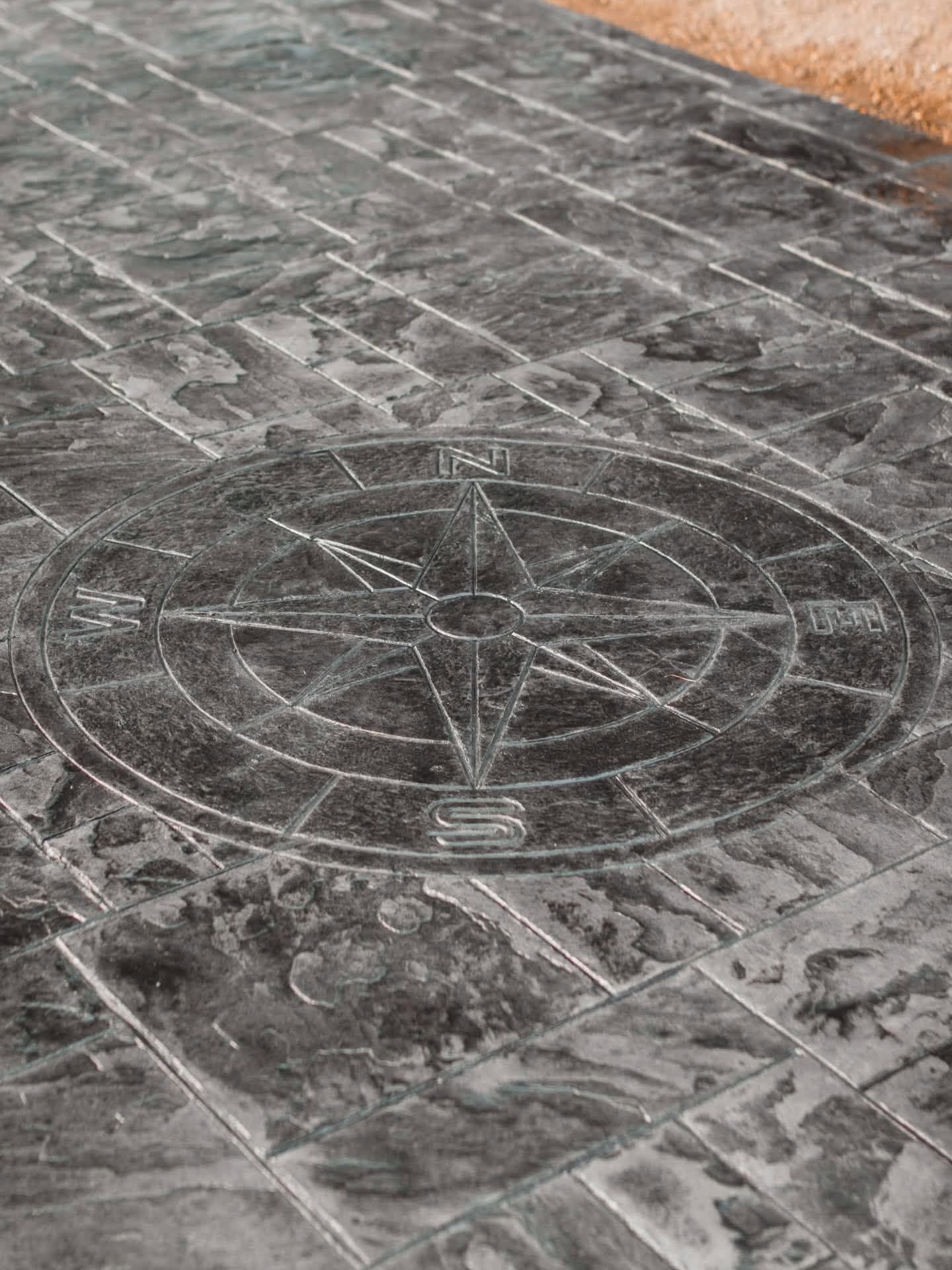 Stamped compass medallion detail